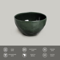 Green ceramic bowl on a gray background with safety and feature icons at the bottom.