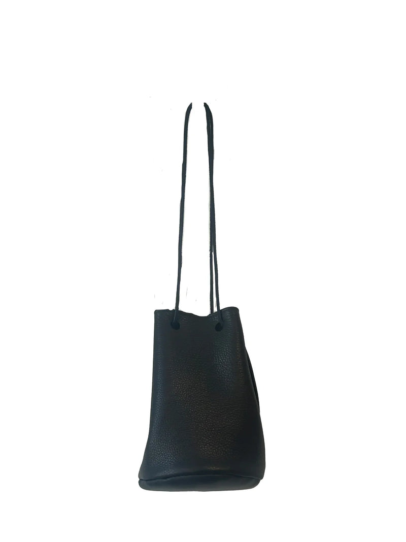 Black leather bucket bag with long handle on a white background