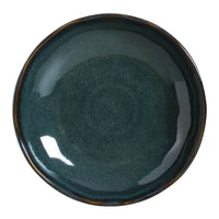 Teal ceramic plate on a white background