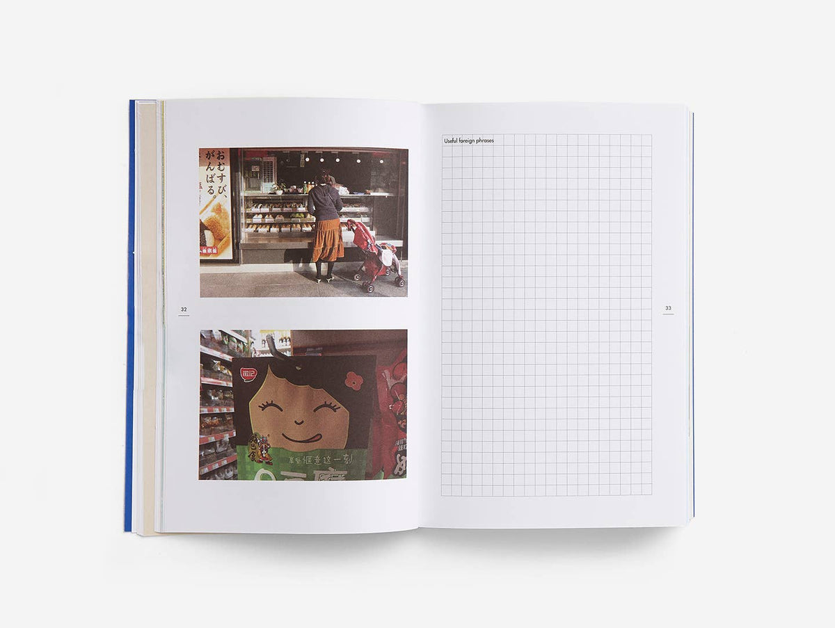 Open book with images and grid pages on a white background