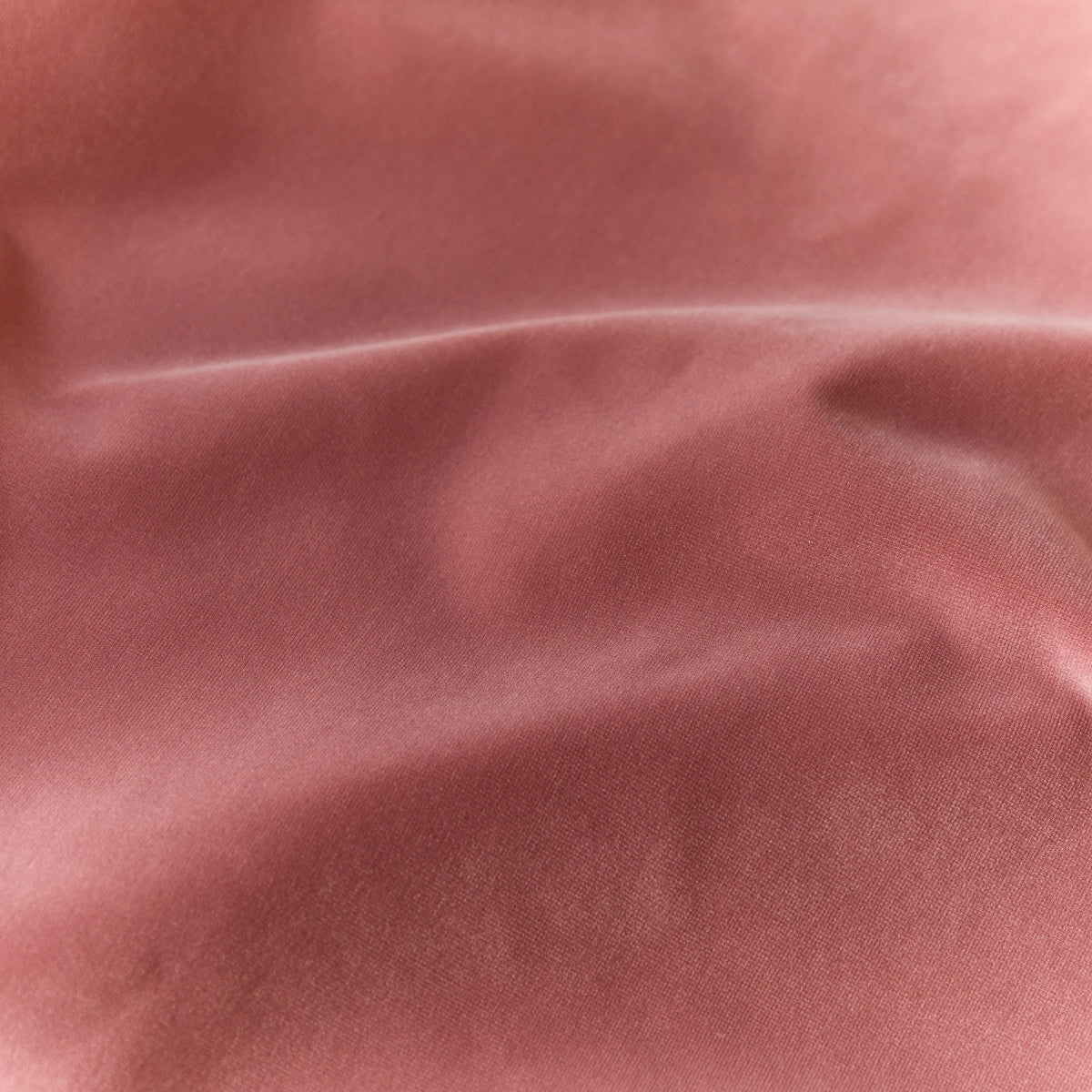Close-up of pink fabric with visible texture