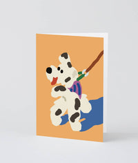 Card with a dog illustration on an orange background