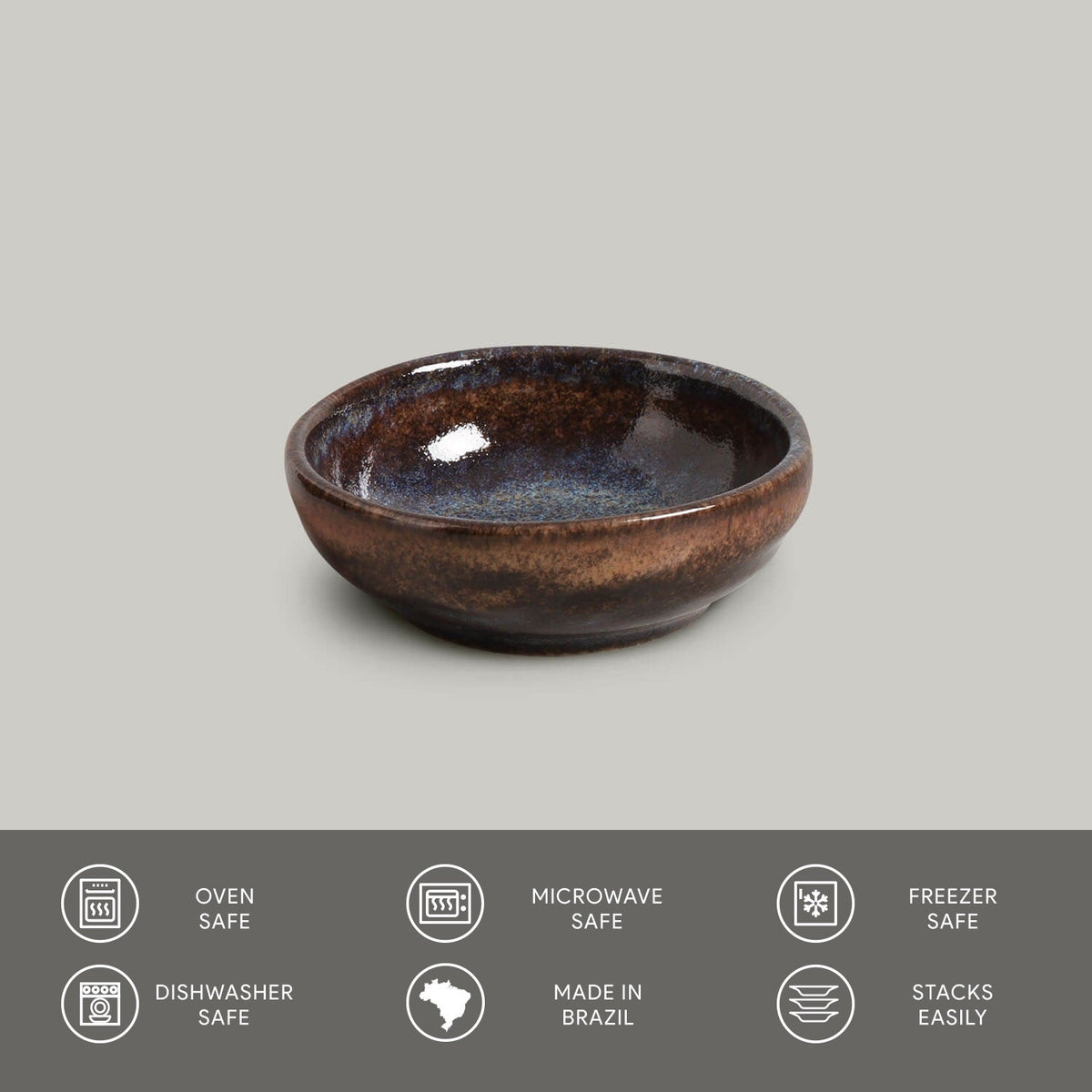 Ceramic ramekin with speckled design on a gray background