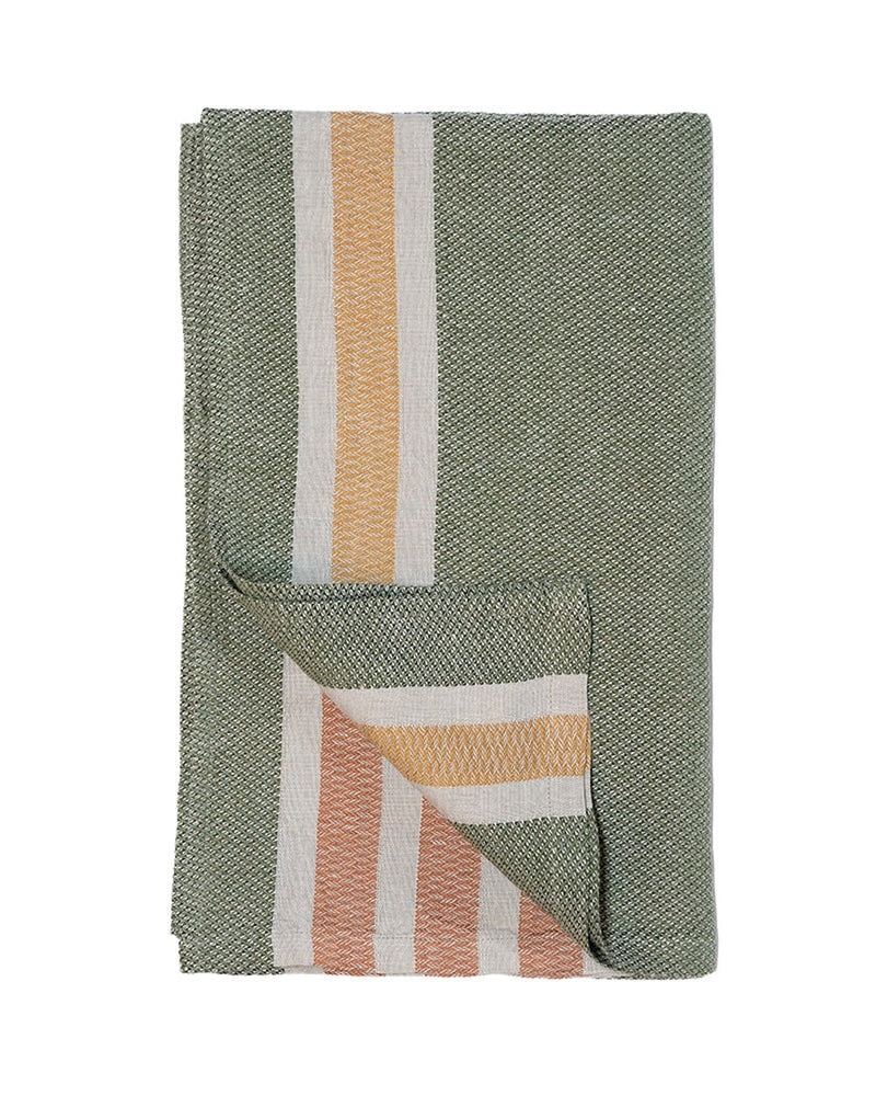 Green woven towel with colorful striped pattern on a white background
