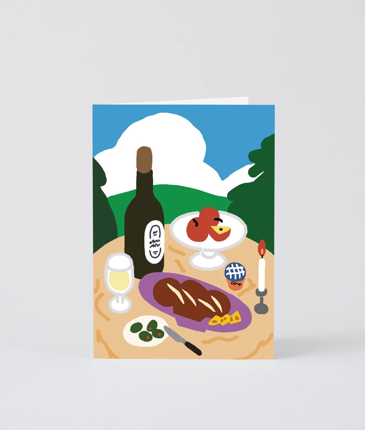 Illustration of a meal setting with a bottle, food, and cutlery on a table outdoors.