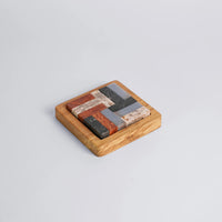 Stone puzzle in a wood base