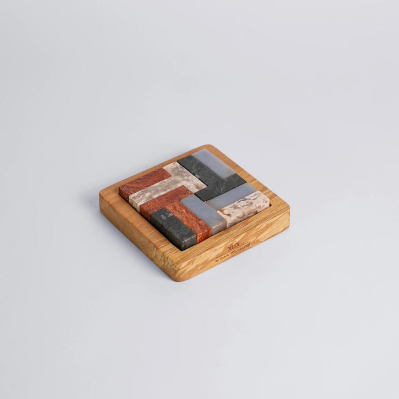 Stone puzzle in a wood base