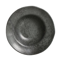 Round metallic plate on a white background