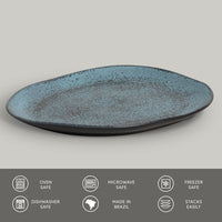 Blue ceramic plate on a gray background with safety and feature icons at the bottom.