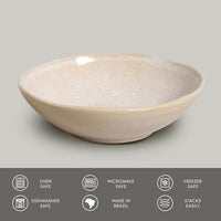 Beige ceramic bowl on a gray background with safety and feature icons at the bottom.