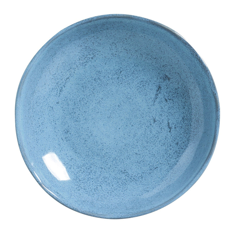 Blue ceramic pasta plate on a white background