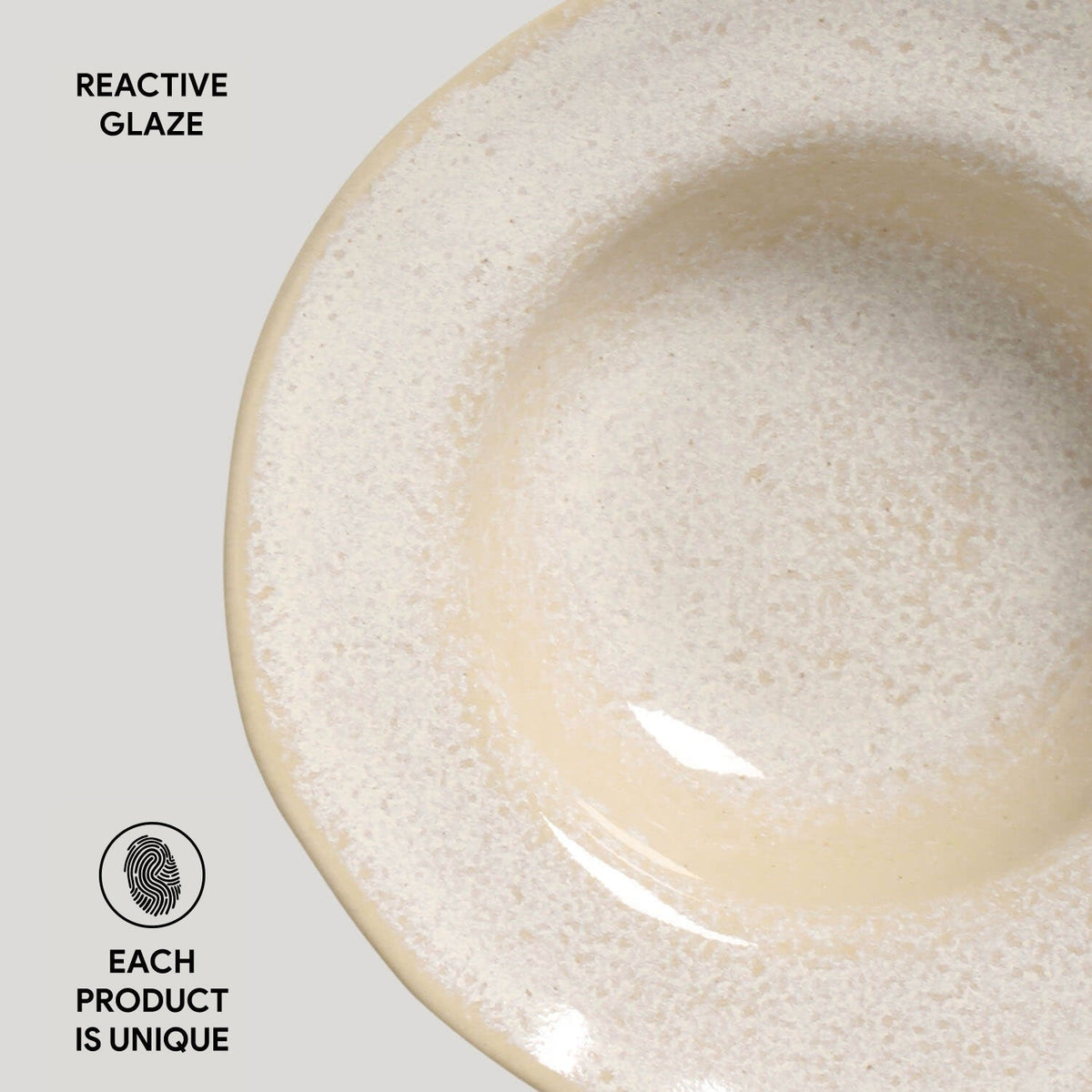 Ceramic bowl with reactive glaze on a light background