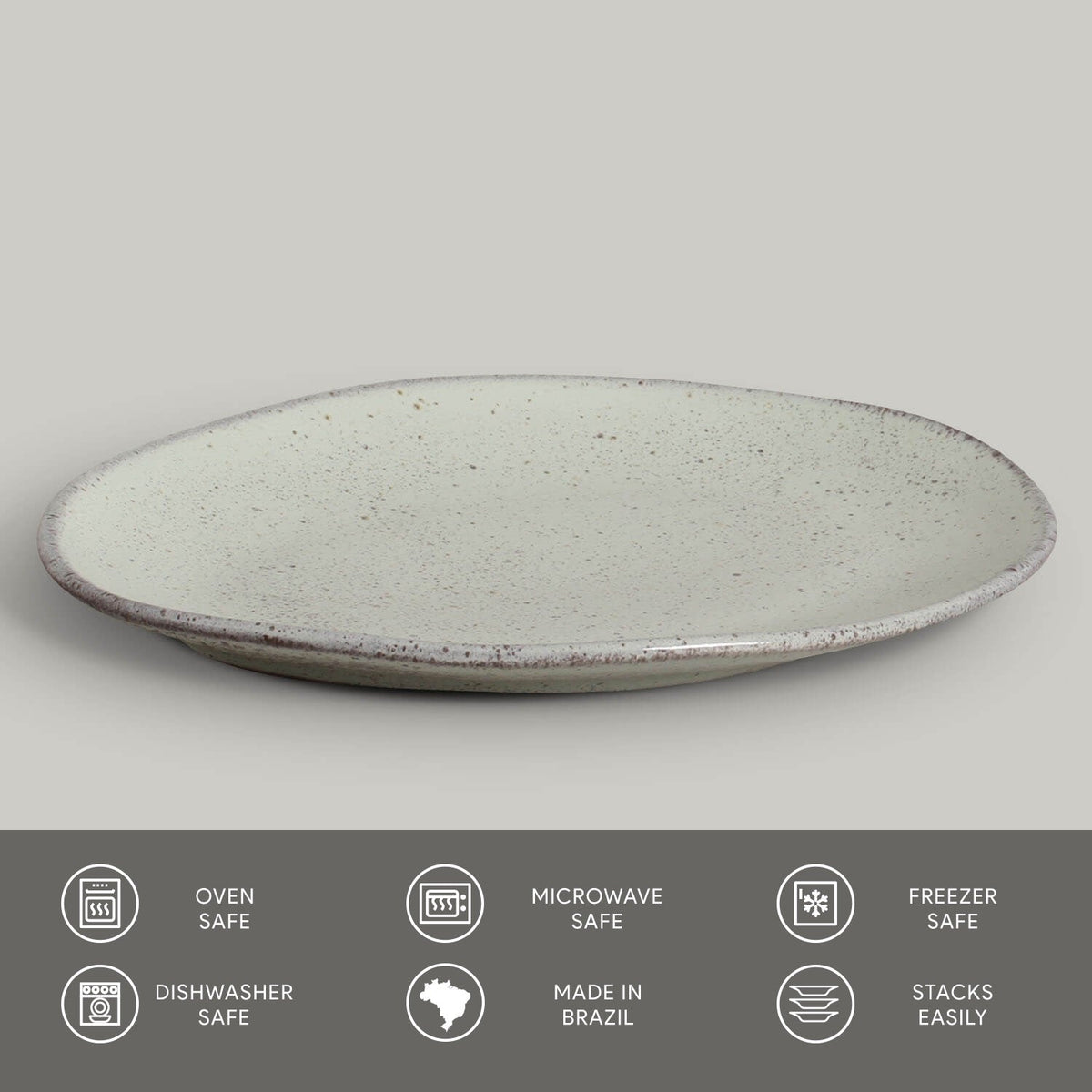 Round ceramic plate with speckled texture on a light gray background, featuring icons and text about safety and features.