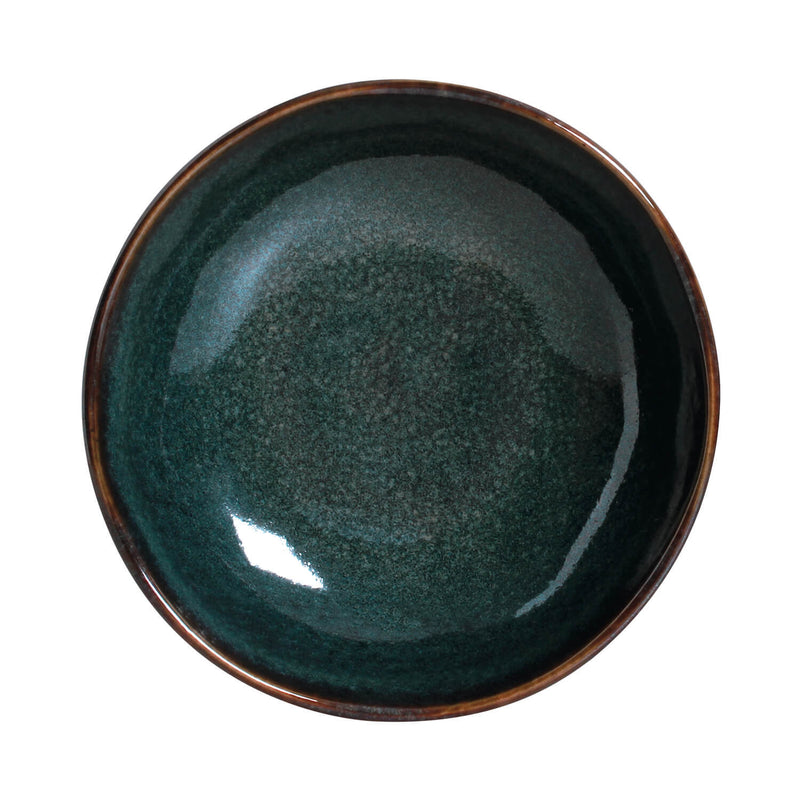 Deep teal ceramic bowl on a white background