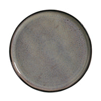 Round ceramic plate with a speckled grayish-brown design on a white background