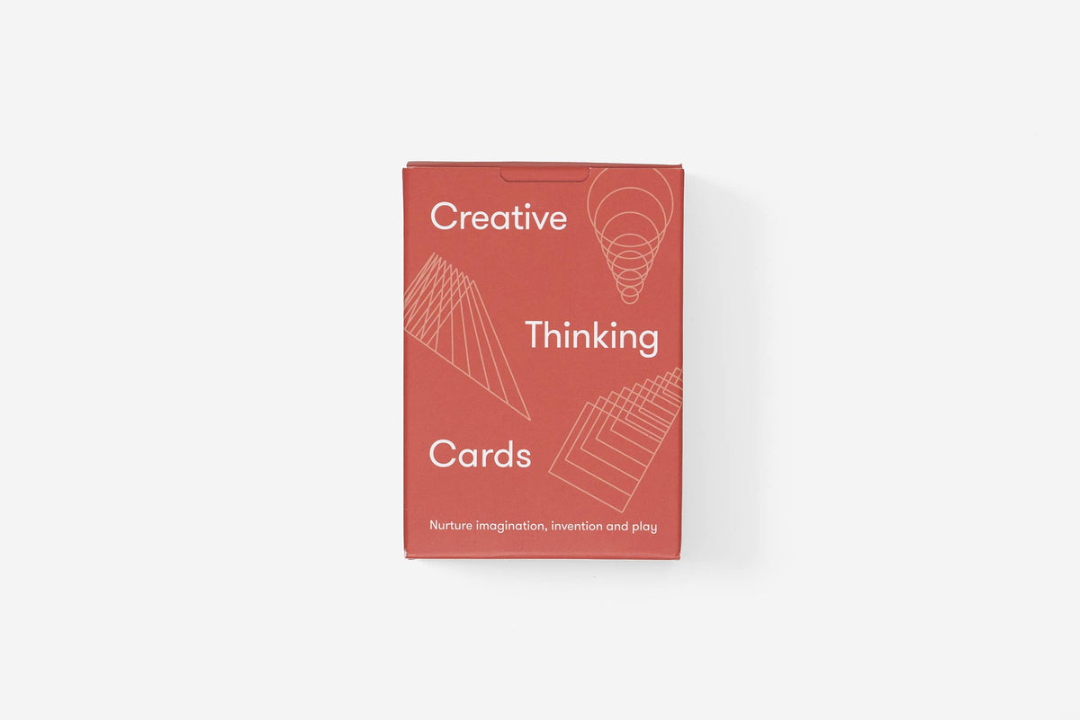 Red card deck packaging with 'Creative Thinking Cards' text on a white background