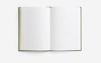 Open notebook with dotted pages on a white background