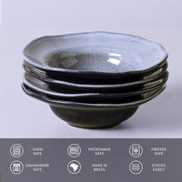 Stack of ceramic bowls on a light gray background with safety and feature icons at the bottom.