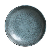 Speckled blue ceramic plate on a white background
