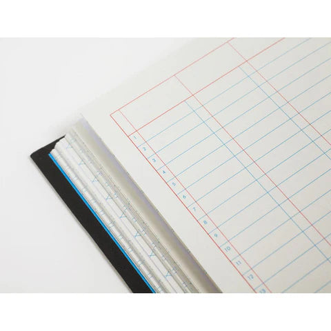 Open notebook with grid paper on a white background