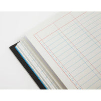 Open notebook with grid paper on a white background