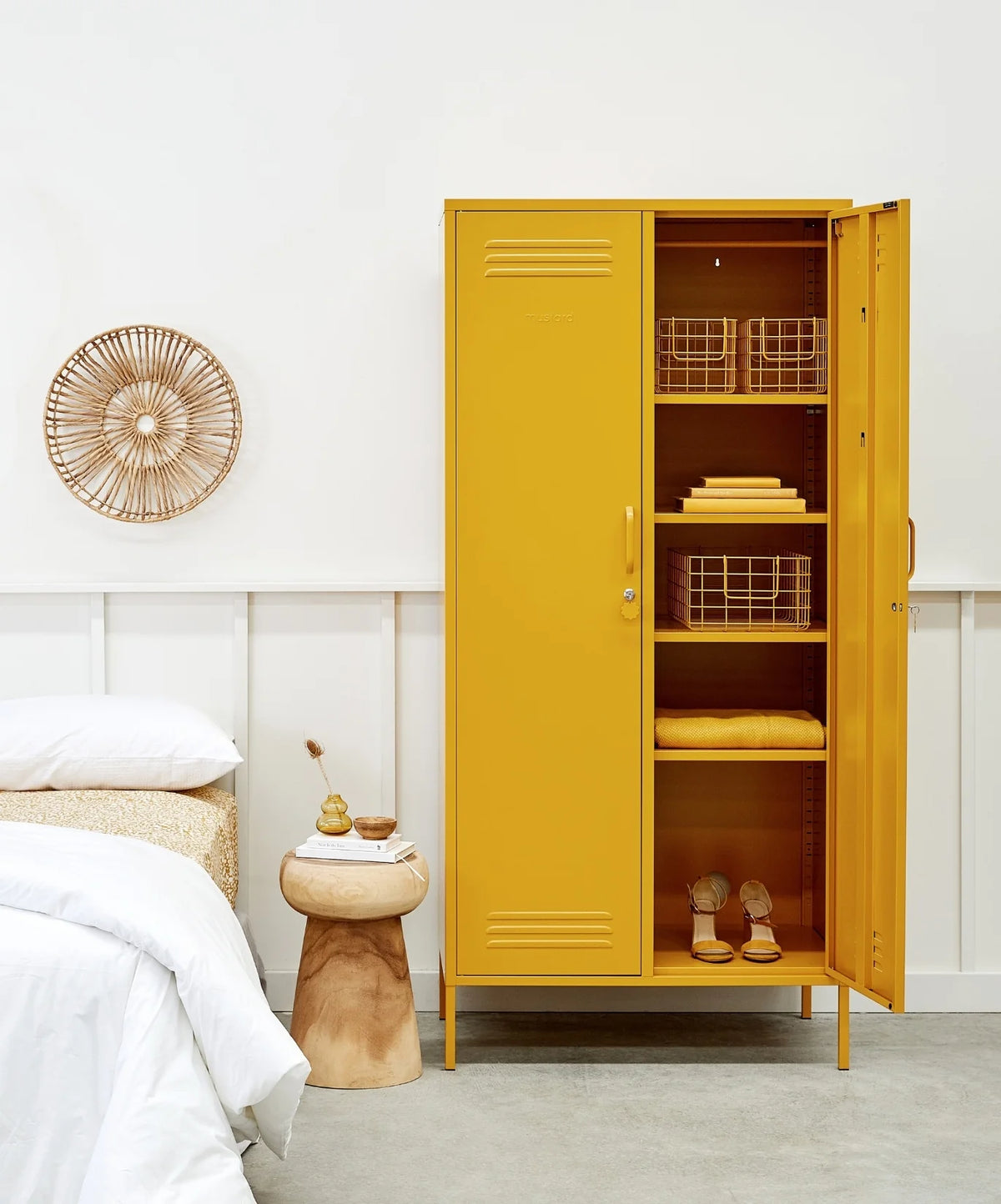 Yellow metal locker with open doors in a bedroom setting