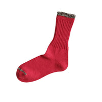 Red ankle socks with contrast trim on a white background