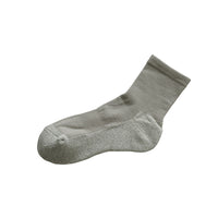 Light grey ankle sock on a white background
