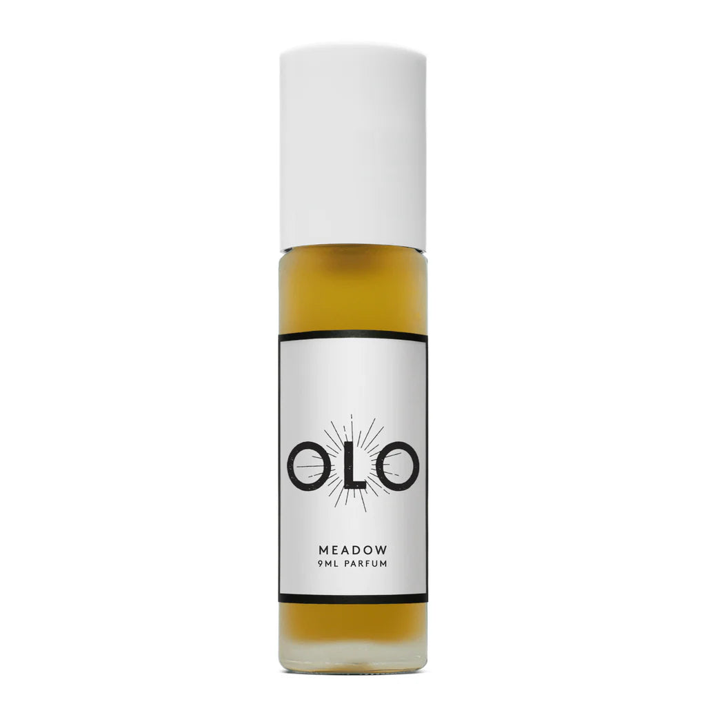 Perfume bottle labeled 'OLO' with a white cap and gold body on a white background