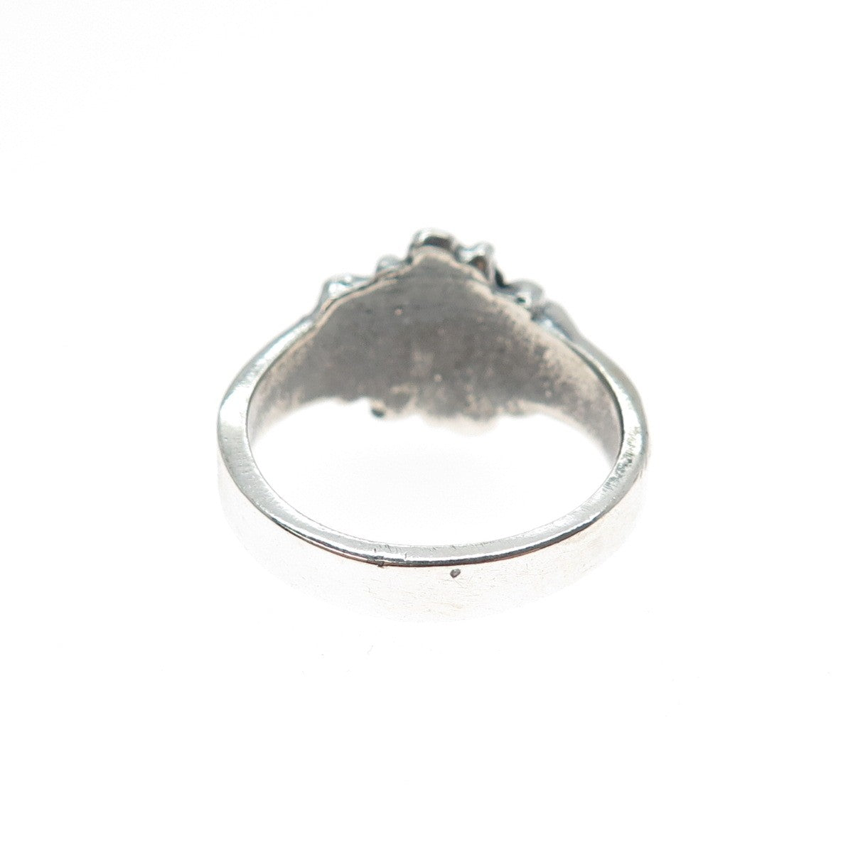 Silver ring on a white background
