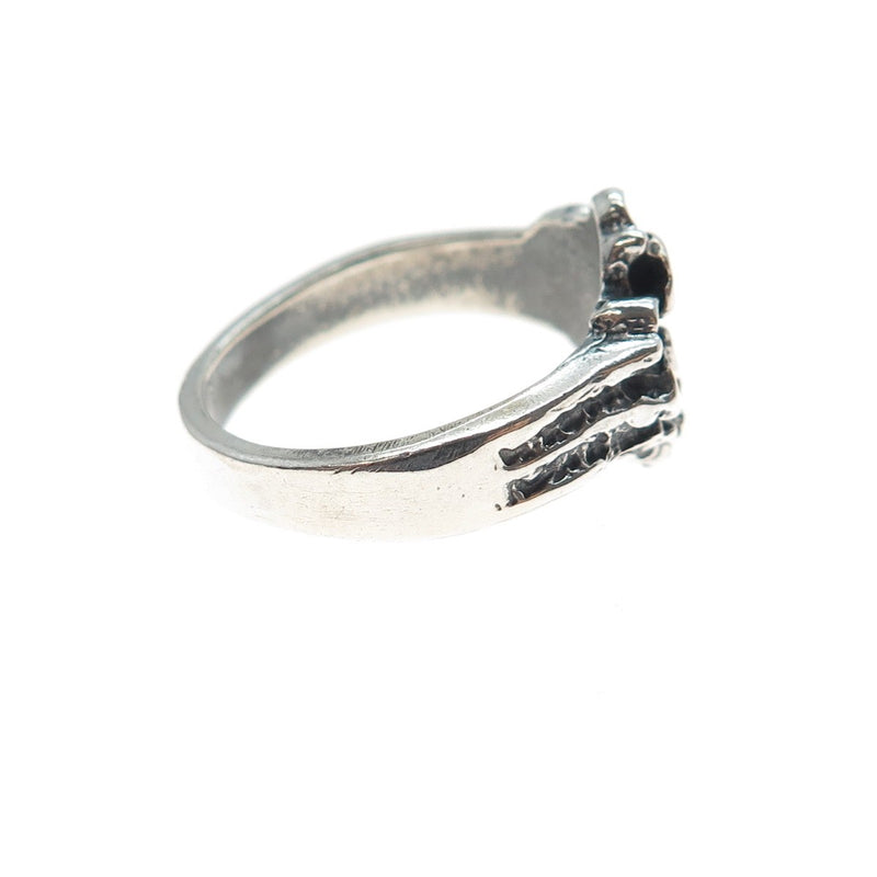 Silver ring with texture on a white background